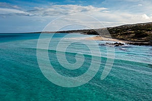 Aerial view of the picturesque white sand beach of La Pelosa near Stintino in Sardinia