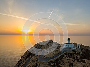 Aerial view of the Pietra Lighthouse at sunset. Red Island, Corsica, France