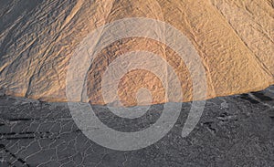 Aerial view of pink salt lake. Salt production plants evaporated brine pond in a salt lake.