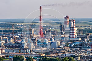 Aerial view on pipes of chemical enterprise plant. Air pollution concept. Industrial landscape environmental pollution waste of