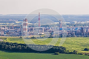 Aerial view on pipes of chemical enterprise plant. Air pollution concept. Industrial landscape environmental pollution waste of