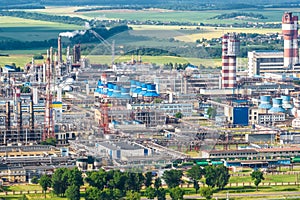 Aerial view on pipes of chemical enterprise plant. Air pollution concept. Industrial landscape environmental pollution waste of