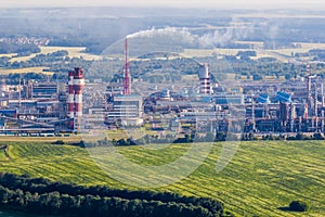 Aerial view on pipes of chemical enterprise plant. Air pollution concept. Industrial landscape environmental pollution waste of