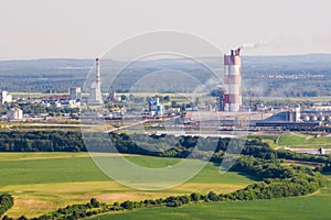 Aerial view on pipes of chemical enterprise plant. Air pollution concept. Industrial landscape environmental pollution waste of