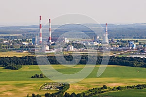 Aerial view on pipes of chemical enterprise plant. Air pollution concept. Industrial landscape environmental pollution waste of