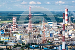 Aerial view on pipes of chemical enterprise plant. Air pollution concept. Industrial landscape environmental pollution waste of