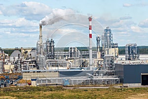 aerial view on pipes of chemical enterprise plant. Air pollution concept. Industrial landscape environmental pollution waste of