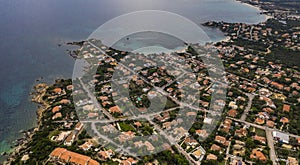 Aerial view of Pittulongu, White Beach in Olbia, blue water, amazing Vegetation and sandy beaches