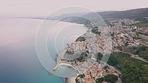 Aerial view of Pizzo, video shot on a drone. Flight of a drone over Pizzo overlooking the bay, pier and old town