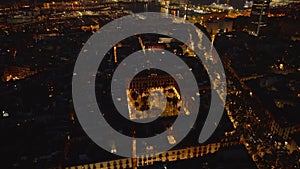 Aerial view of Placa Reial and surrounding old buildings in historic city centre at night Barcelona, Spain