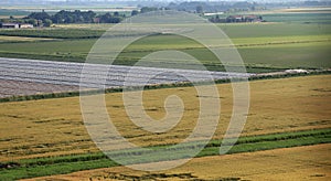 aerial view of the plain with fields in the po valley in italy