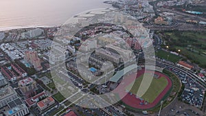 Aerial view of Playa de las Americas on sunset in Tenerife, Canary Islands