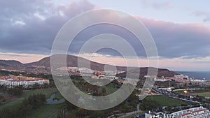 Aerial view of Playa de las Americas on sunset in Tenerife, Canary Islands