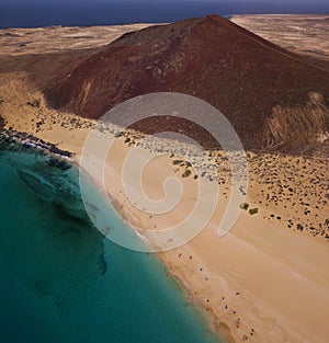 Aerial view of the Playa de las Conchas and mountain Bermeja, La Graciosa island in Lanzarote, Canary island. Spain