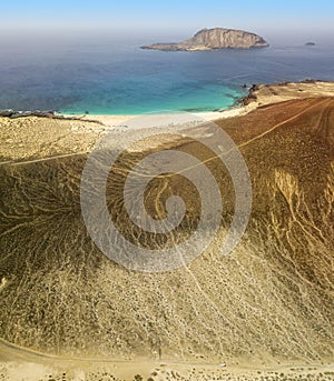 Aerial view of the Playa de las Conchas and mountain Bermeja, La Graciosa island in Lanzarote. Spain photo