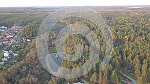 Aerial view of the pond in the forest, autumn time. Nature and landscape, aerial view of a forest and pond, autumn