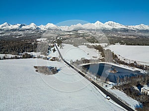 Aerial view of the pond in Strba and the High Tatras in Slovakia