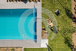 Aerial View of a Poolside and Grass Turfs Installation