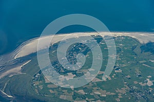 Aerial view of popular German seaside spa Sankt Peter-Ording with the surrounding landscape