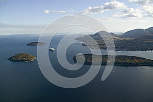 Aerial view of Porcupine Islands, Frenchman Bay and Holland America cruise ship in harbor, Acadia National Park, Maine photo
