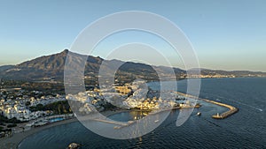 aerial view of port Banus in a beautiful sunset in the city of Marbella, Spain
