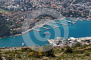 Aerial view of port of Dubrovnik with cruise ships and yachts, Adriatic sea