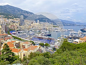 Aerial view of Port Hercule, marina and harbor for boats, luxury yachts and cruise ships in Monaco, Monte Carlo.