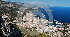 Aerial view of port Hercule of the Principality Monaco at sunny day, Monte-Carlo, view point in La Turbie, Megayachts, a