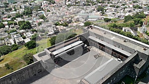 Aerial view of Port Louis fortress in Mauritius, going down from the sky