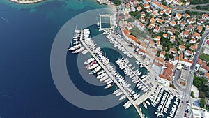 Aerial view of port or marina with sailboats and yachts in Croatian bay Korcula.