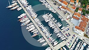 Aerial view of port or marina with sailboats and yachts in Croatian bay Korcula.