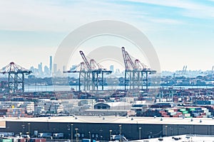 Aerial view of the Port of Newark Elizabeth Marine terminal with the NYC skyline in the background