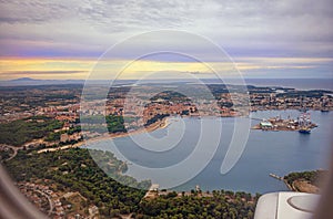 Aerial view through porthole of aircraft, flying over Thessaloniki, Croatia