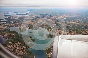 Aerial view through porthole of aircraft, flying over Thessaloniki, Croatia,Istria,Europe