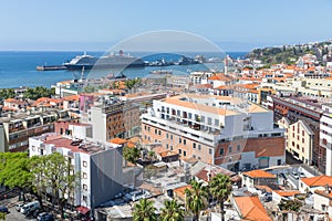 Aerial view of Portugese Funchal with a cruise ship in the harbor