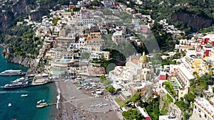 Aerial view of Positano with comfortable beach and blue sea on Amalfi Coast in Campania, Italy. Positano village on the Amalfi