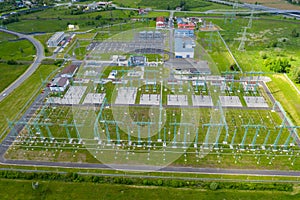 Aerial view power plant. High voltage electric power substation. Electrical transformer in voltage substation, cables and wires
