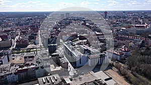 Aerial view of Poznan modern cityscape overlooking new residential areas and historical center on sunny spring day