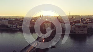 Aerial view of Prague Old Town architecture and Charles Bridge over Vltava river at sunset. Old Town of Prague, Czech