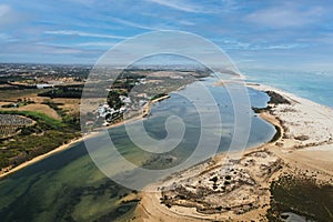 Aerial view of Praia da Fabrica, also known as Praia de Cacela Velha beach, a sandy barrier island at the mouth of the Ria Formosa photo