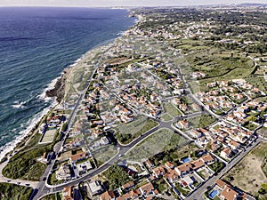 Aerial view of Praia das Macas, a small town along south Portuguese coastline near Lisbon, view of the town facing the Atlantic photo