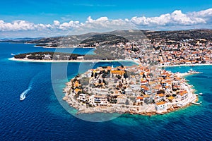 Aerial view of Primosten old town on the islet, Dalmatia, Croatia. Primosten, Sibenik Knin County, Croatia. Resort town on the