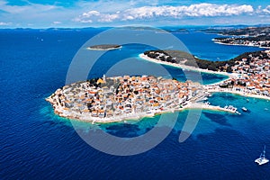 Aerial view of Primosten old town on the islet, Dalmatia, Croatia. Primosten, Sibenik Knin County, Croatia. Resort town on the