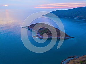 Aerial view of Promthep Cape viewpoint at sunset with Andaman sea in Phuket Island, tourist attraction in Thailand in travel trip