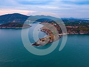 Aerial view of Promthep Cape viewpoint at sunset with Andaman sea in Phuket Island, tourist attraction in Thailand in travel trip