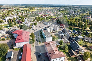 aerial view on provincial city or big village housing area with many buildings, roads and garden