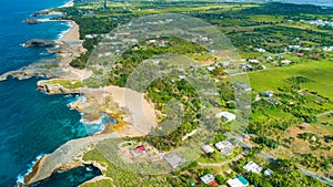 Aerial view of Puerto Rico. Faro Los Morrillos de Cabo Rojo. Playa Sucia beach and Salt lakes in Punta Jaguey.