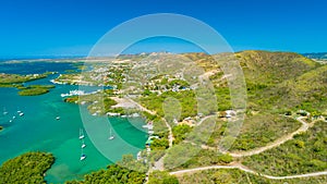 Aerial view of Puerto Rico. Faro Los Morrillos de Cabo Rojo. Playa Sucia beach and Salt lakes in Punta Jaguey.