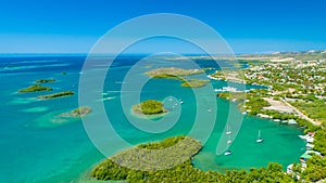 Aerial view of Puerto Rico. Faro Los Morrillos de Cabo Rojo. Playa Sucia beach and Salt lakes in Punta Jaguey. photo