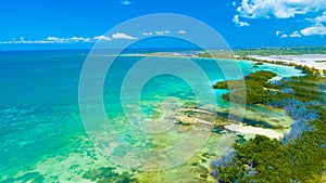 Aerial view of Puerto Rico. Faro Los Morrillos de Cabo Rojo. Playa Sucia beach and Salt lakes in Punta Jaguey.